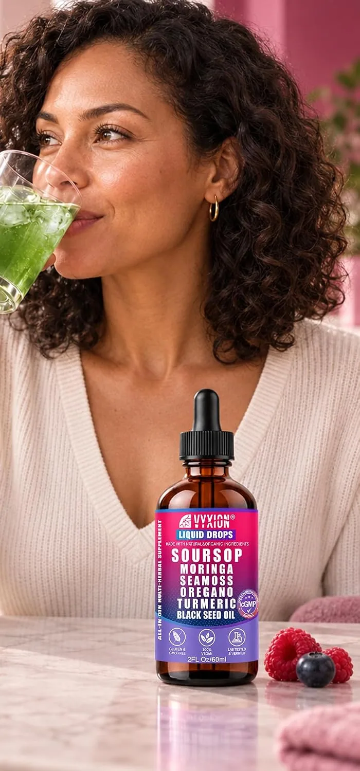 A woman drinking from a glass at a table, a bottle of Vyxion Mixed Berry soursop drops beside her