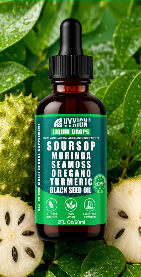 A bottle of Vyxion Original soursop drops among soursop leaves and halved soursop fruit