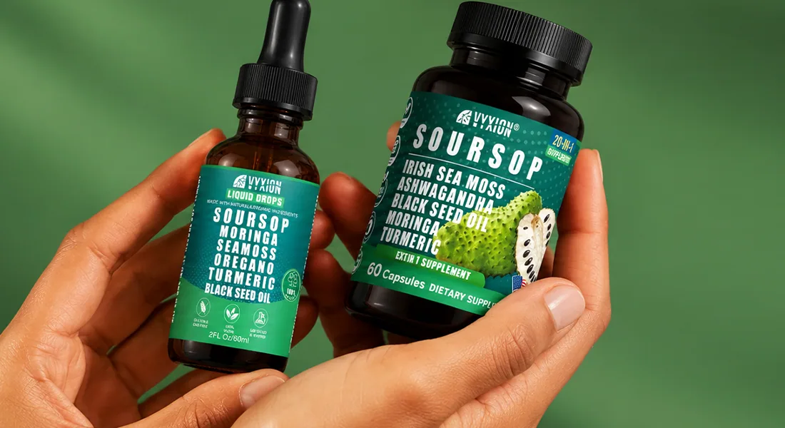 Two hands holding a bottle of Vyxion soursop drops and a bottle of Vyxion soursop capsules